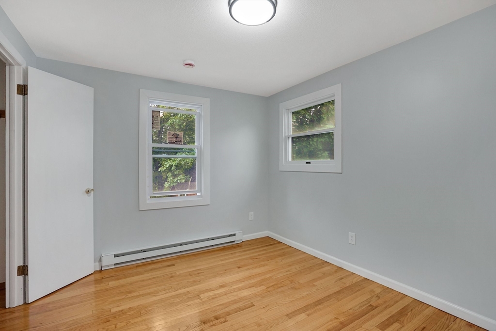 738 Piper Road West Springfield, MA 01089 - Photo 17 of 24 a view of empty room with wooden floor and fan