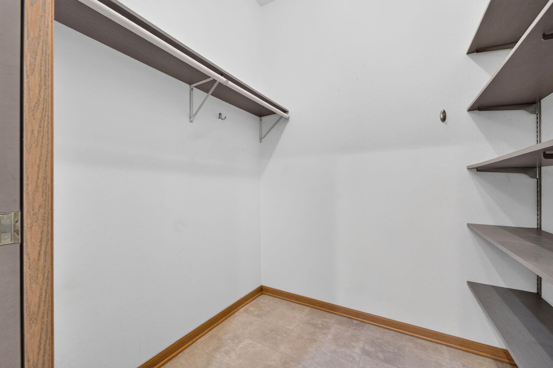 6195 Walnut Lane, Unit 68 Cudahy, WI 53110 - Photo 15 of 20 2nd Bedroom Walk-in Closet