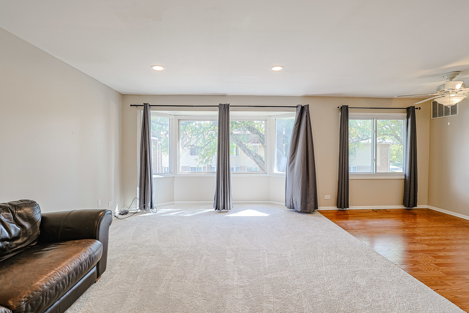 3008 Roberts Drive, Unit 5 Woodridge, IL 60517 - Photo 14 of 22 a living room with furniture and a large window