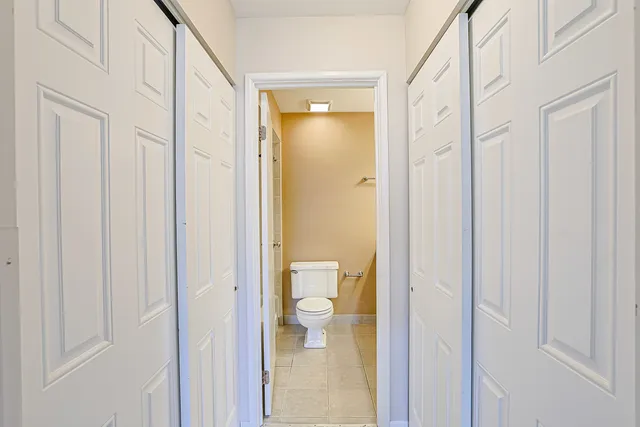 a bathroom with white walls