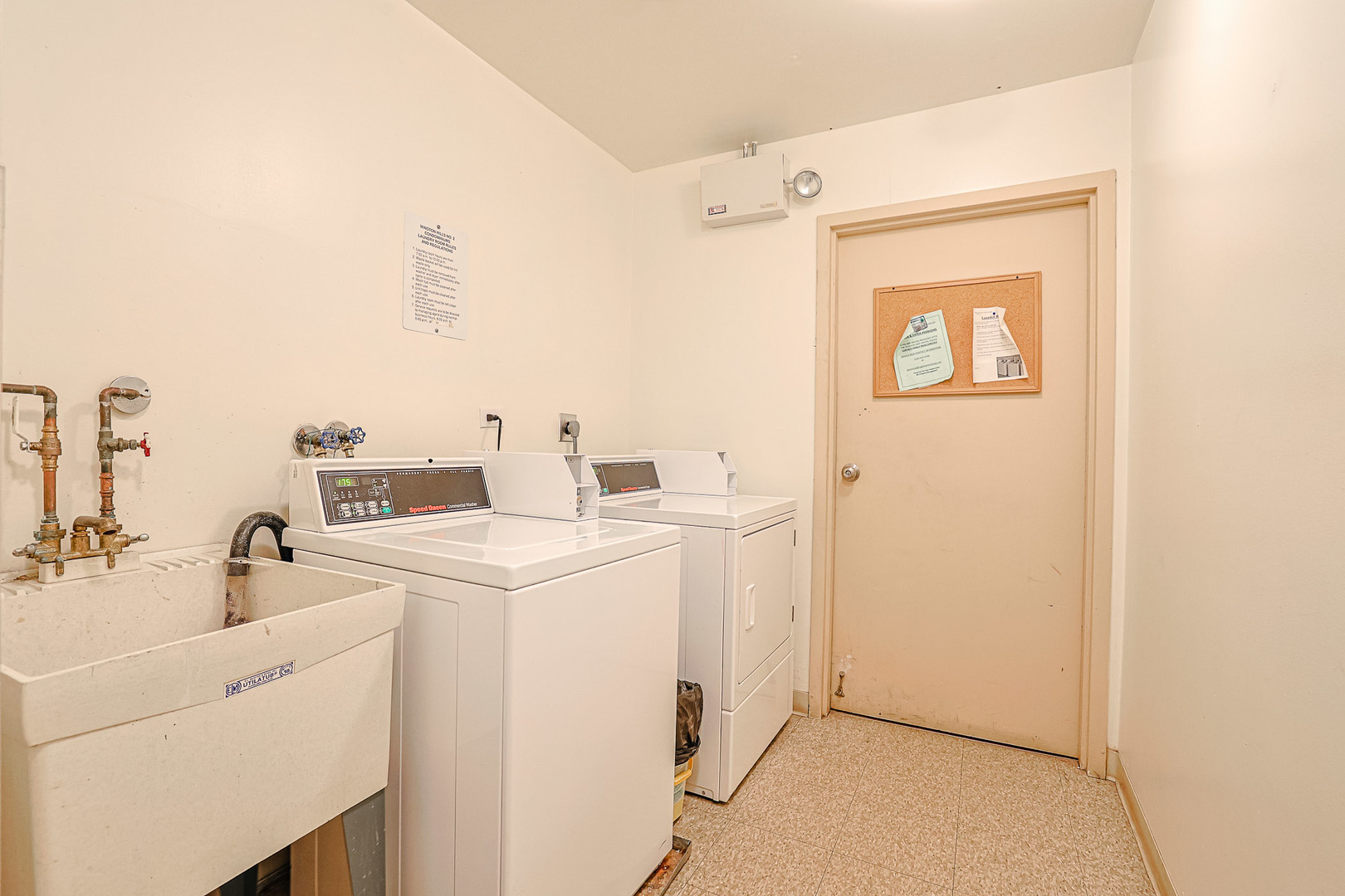 3008 Roberts Drive, Unit 5 Woodridge, IL 60517 - Photo 22 of 22 a utility room with dryer and washer