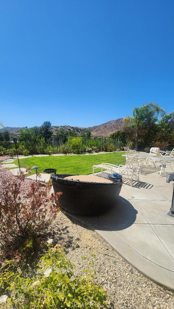 4591 Camino Del Sol Calabasas, CA 91302 - Photo 16 of 21 a view of a outdoor space and a yard
