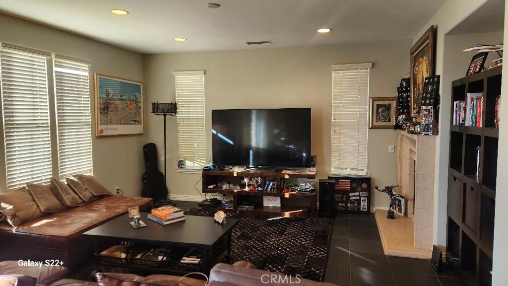 4591 Camino Del Sol Calabasas, CA 91302 - Photo 6 of 21 a living room with furniture and a flat screen tv