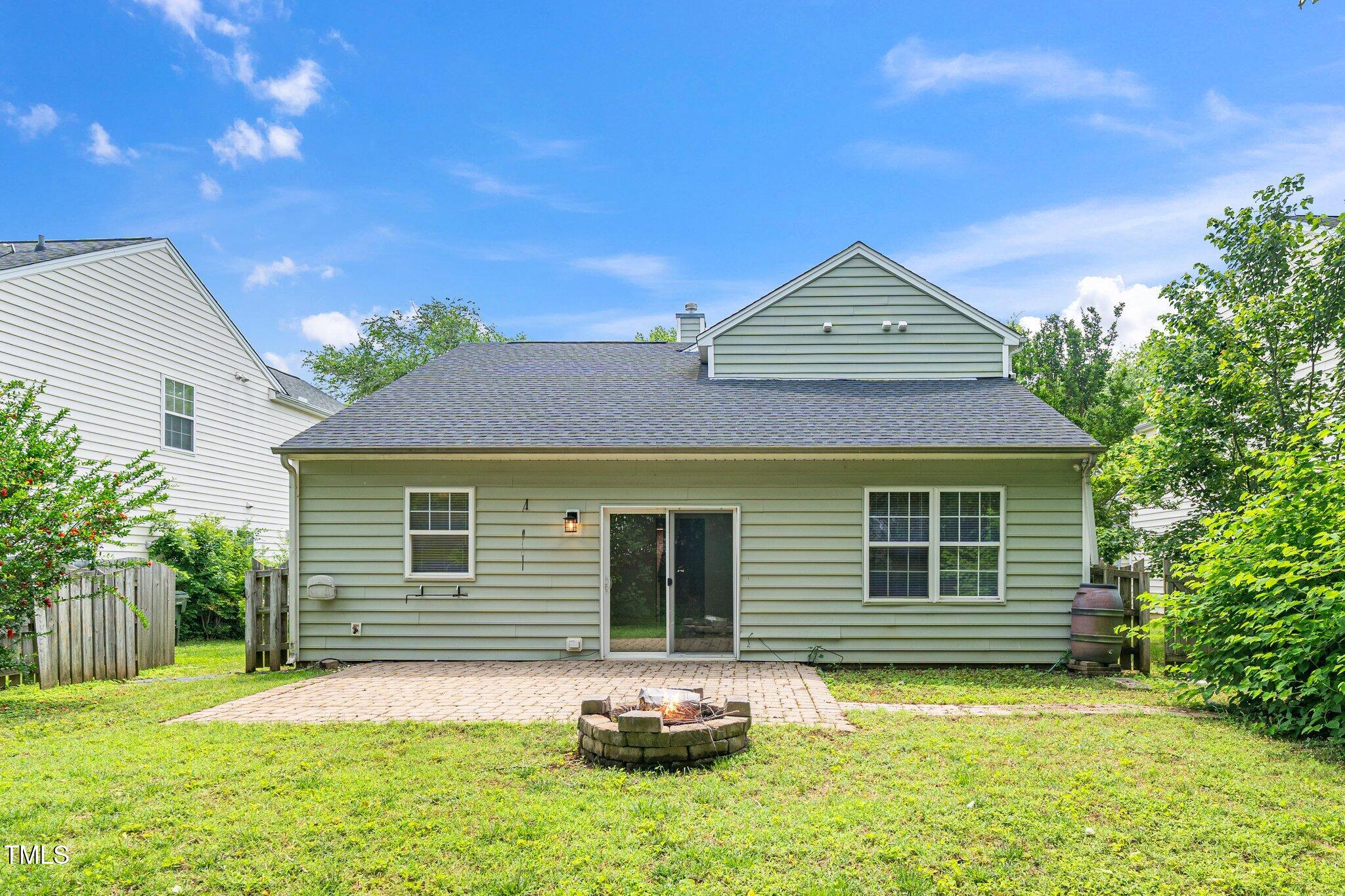 248 Inkster Cove Raleigh, NC 27603 - Photo 30 of 32 a front view of a house with a yard