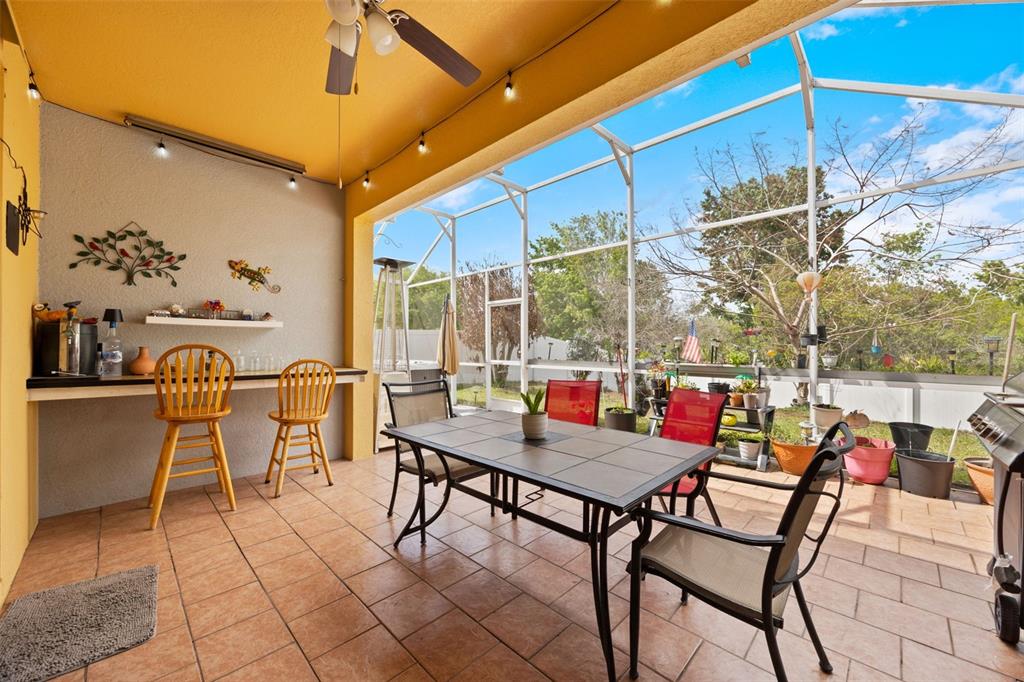 3409 Brant Street St. Cloud, FL 34772 - Photo 26 of 36 a outdoor space with lots of tables and chairs
