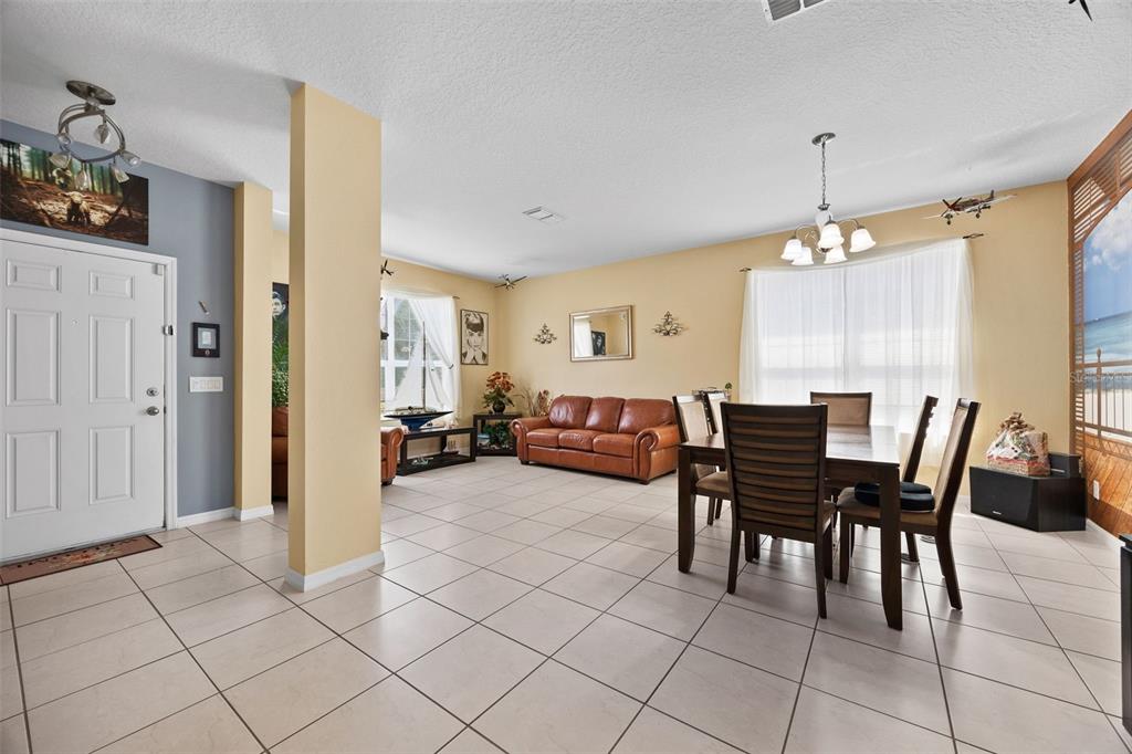 3409 Brant Street St. Cloud, FL 34772 - Photo 5 of 36 a view of a livingroom with furniture and window