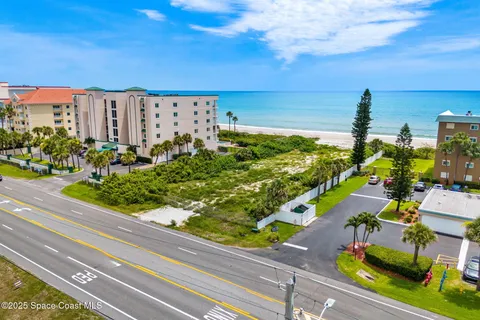 a view of a city with an ocean view