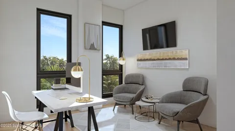 a living room with furniture and large windows