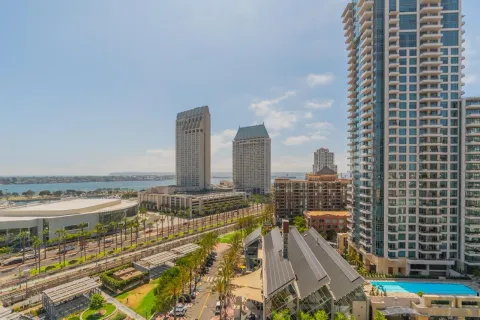 a view of city with tall buildings