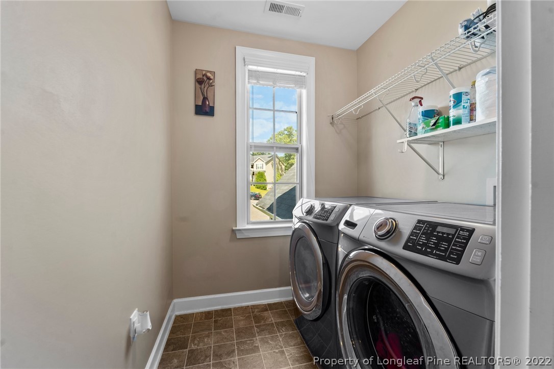 228 Culpepper Road Cameron, NC 28326 - Photo 20 of 36 a utility room with dryer and washer