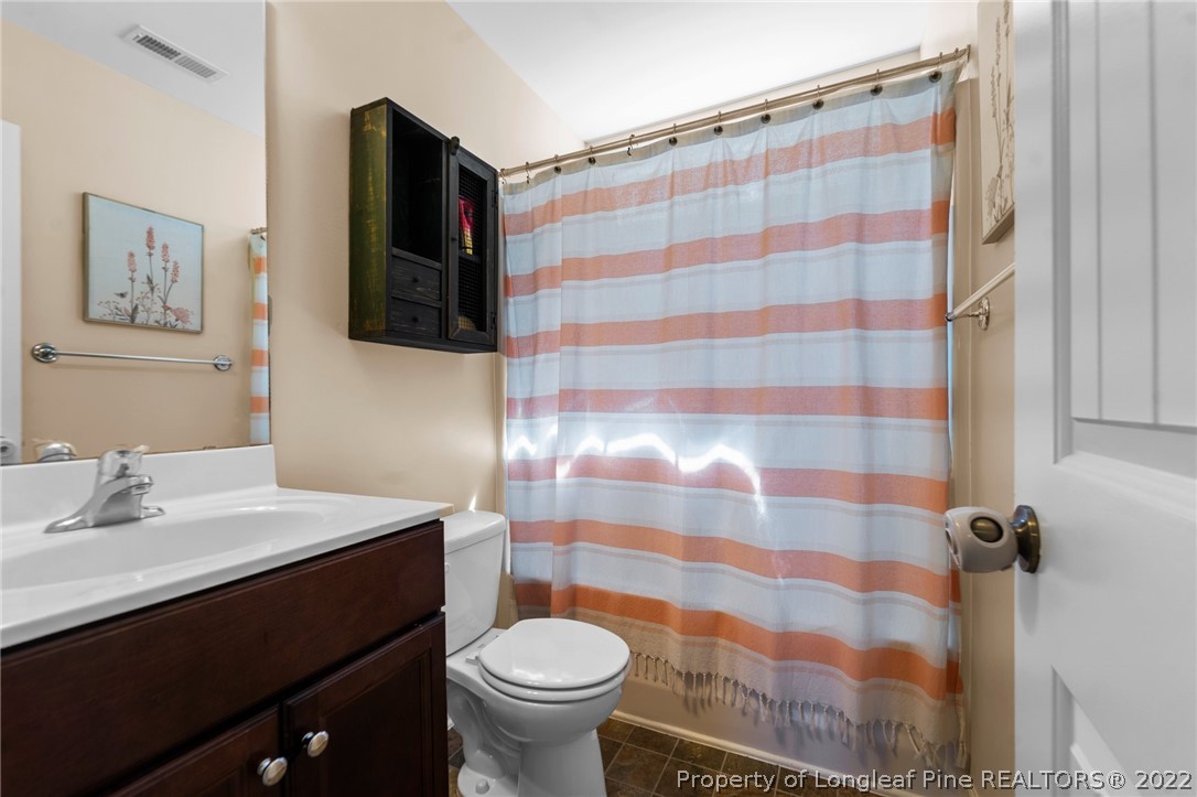 228 Culpepper Road Cameron, NC 28326 - Photo 22 of 36 a bathroom with a sink toilet and shower