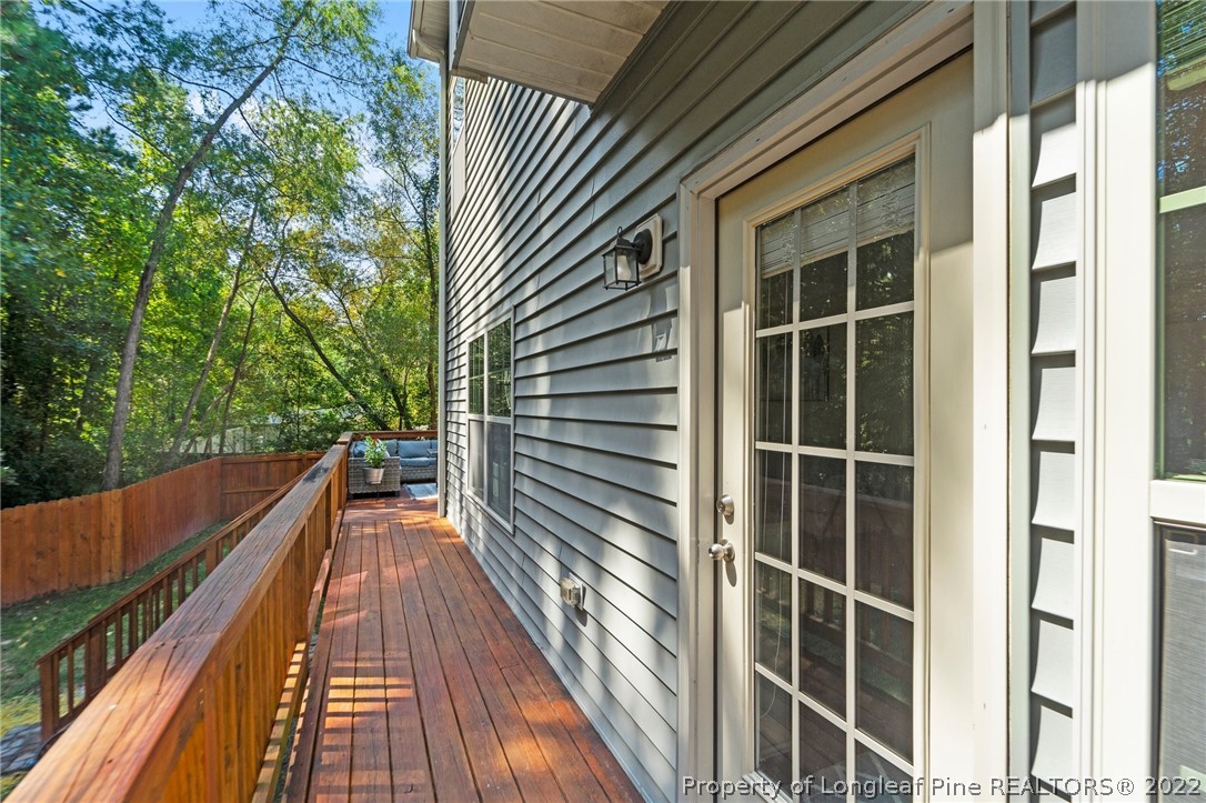 228 Culpepper Road Cameron, NC 28326 - Photo 30 of 36 a view of balcony with wooden floor and fence