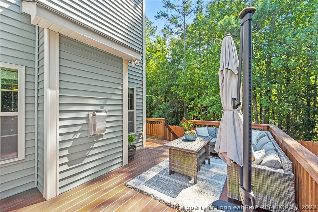 228 Culpepper Road Cameron, NC 28326 - Photo 32 of 36 a view of backyard with seating space and trees