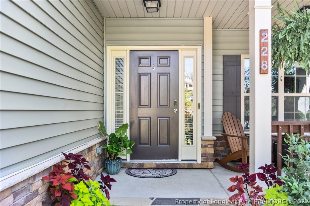 228 Culpepper Road Cameron, NC 28326 - Photo 5 of 36 a front view of a house with a garden