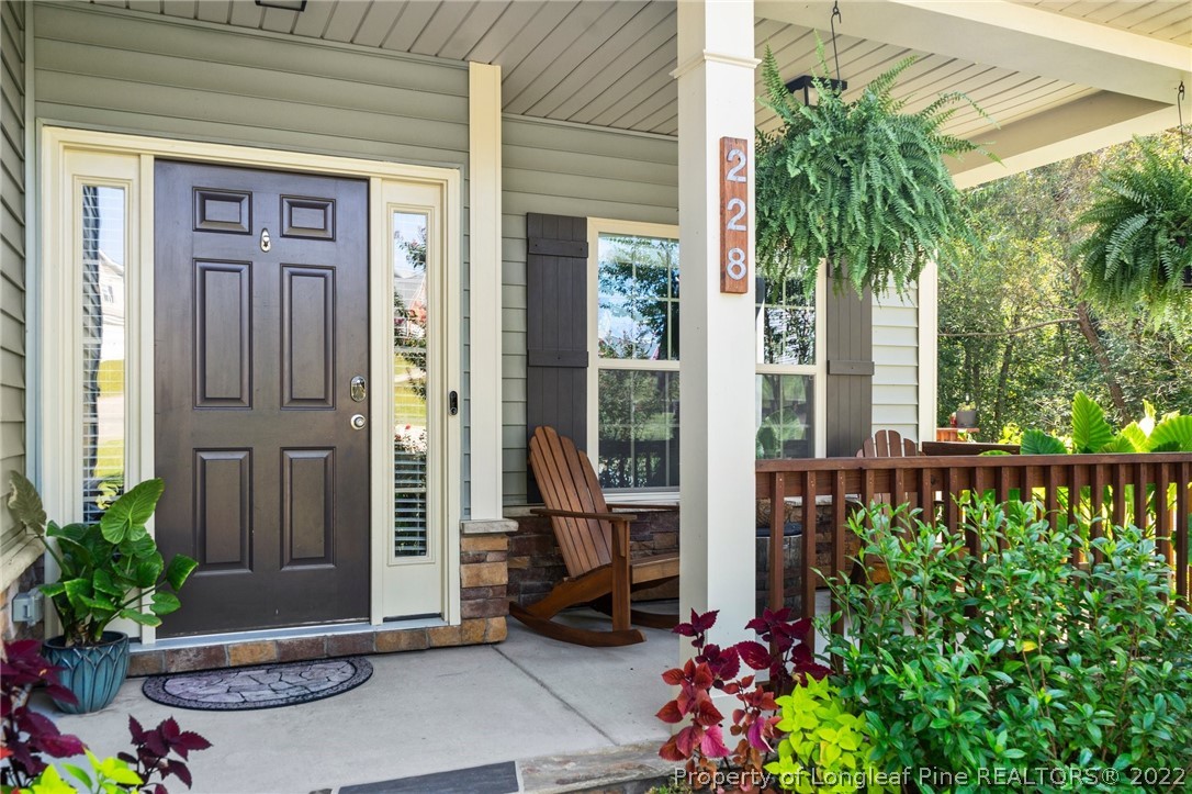 228 Culpepper Road Cameron, NC 28326 - Photo 6 of 36 a front view of a house with a porch