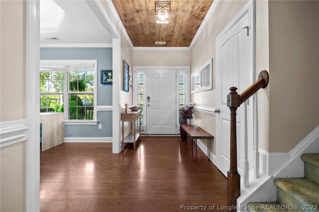 228 Culpepper Road Cameron, NC 28326 - Photo 8 of 36 a view of an entryway with wooden floor and windows