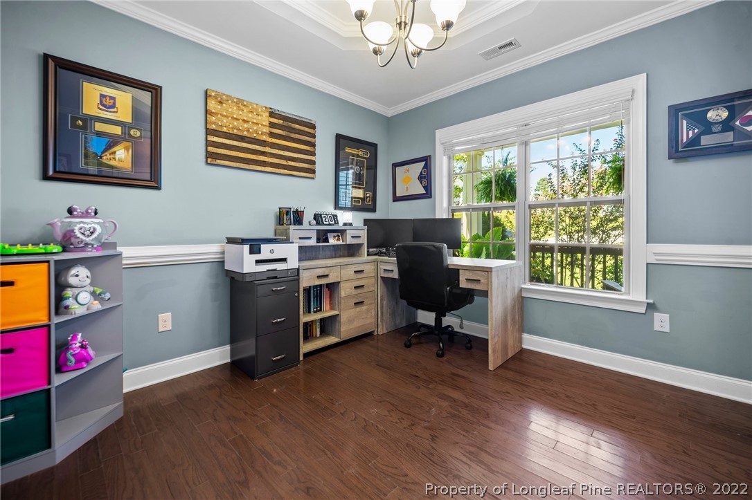 228 Culpepper Road Cameron, NC 28326 - Photo 9 of 36 a view of a workspace with furniture and a window
