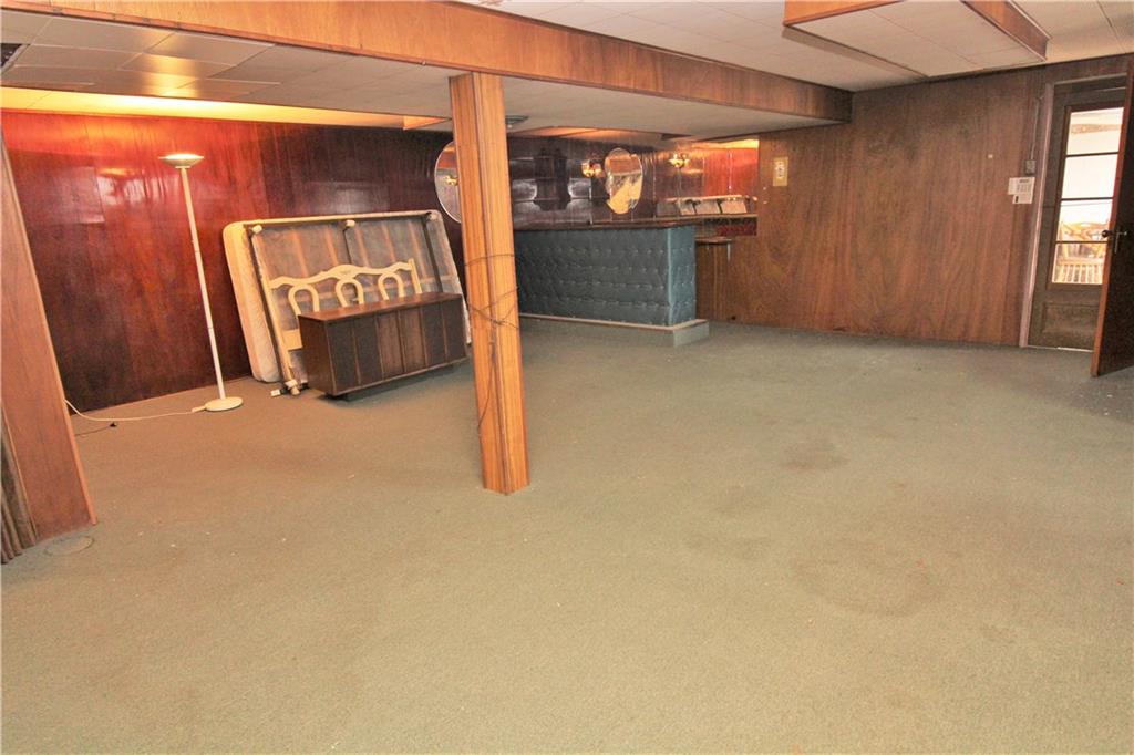 106 Flicker Drive McKees Rocks, PA 15136 - Photo 14 of 17 Spacious game room with 60's bar