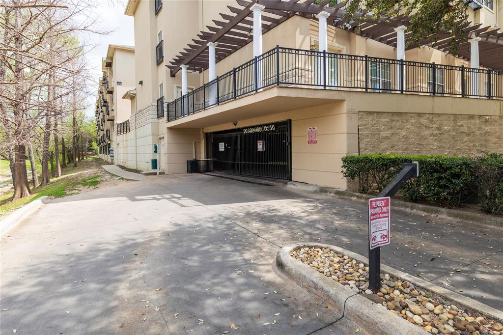 3102 Kings Road, Unit 3310 Dallas, TX 75219 - Photo 19 of 19 a front view of a building with street