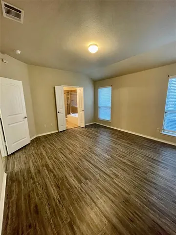 a kitchen with granite countertop stainless steel appliances and counter space