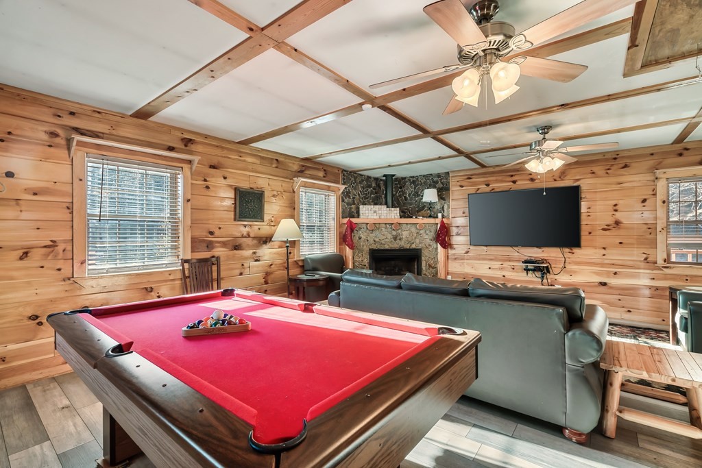 2617 Sharpes Ridge Way Sevierville, TN 37876 - Photo 11 of 43 a living room with pool table and flat screen tv