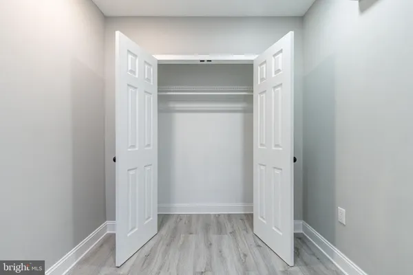 a view of room with hardwood floor
