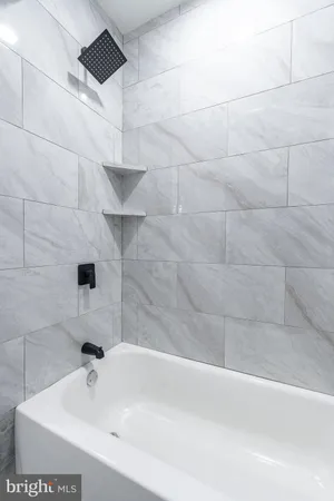 a bathroom with a bathtub