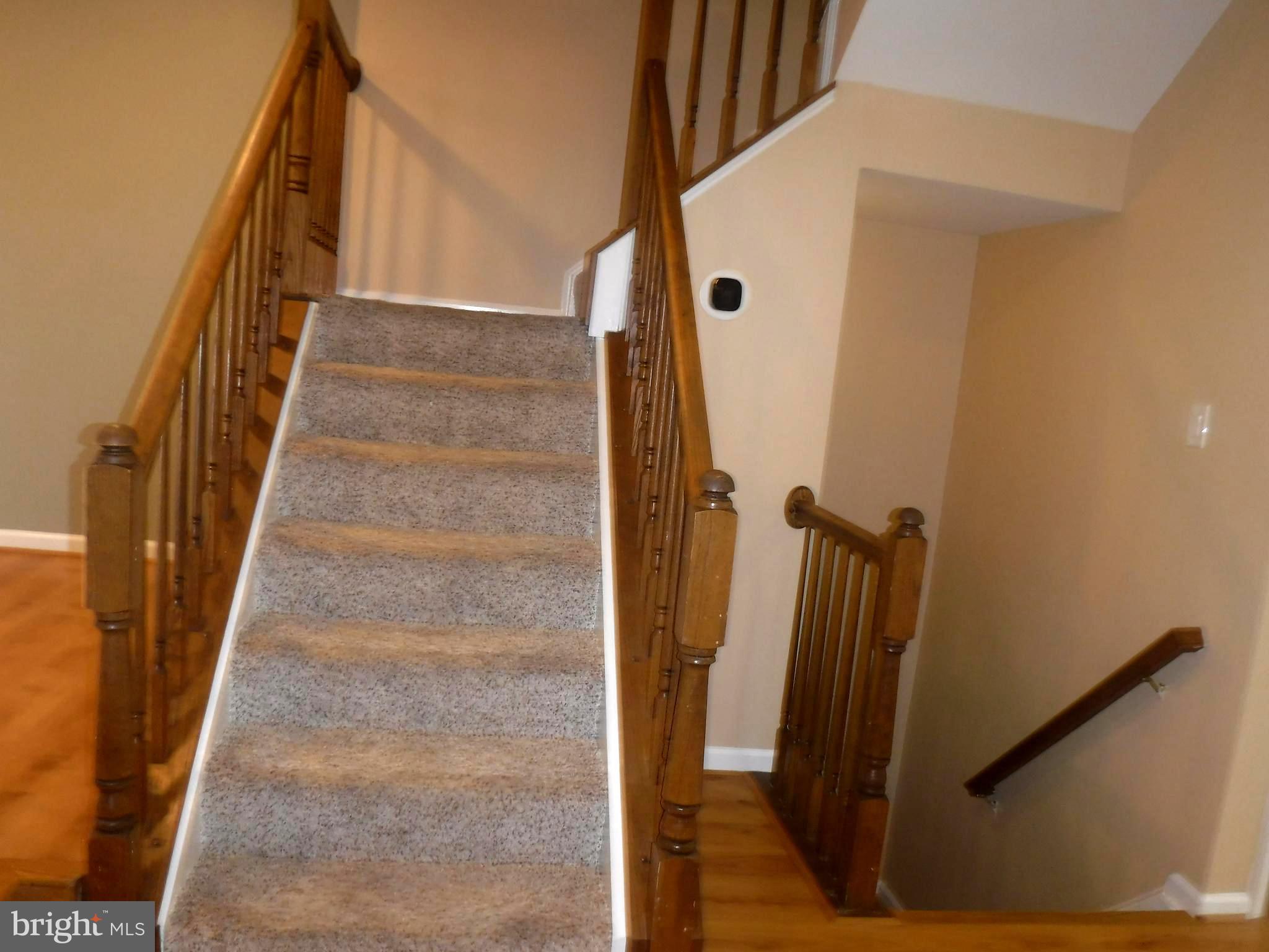 8714 Wadebrook Terrace Springfield, VA 22153 - Photo 14 of 35 Stairs Leading to Upper Level