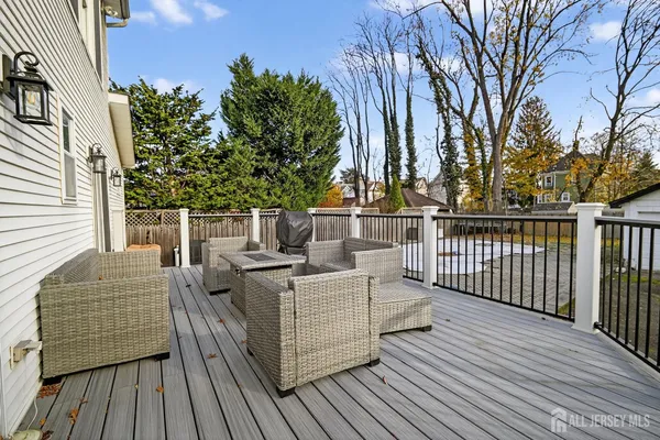 a view of a deck with furniture