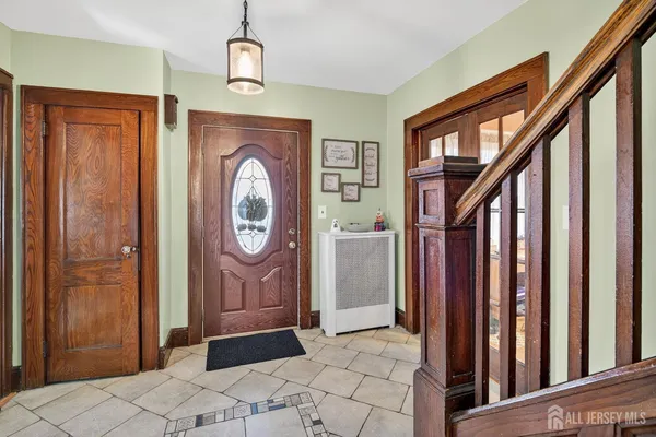 a view of entryway with a door