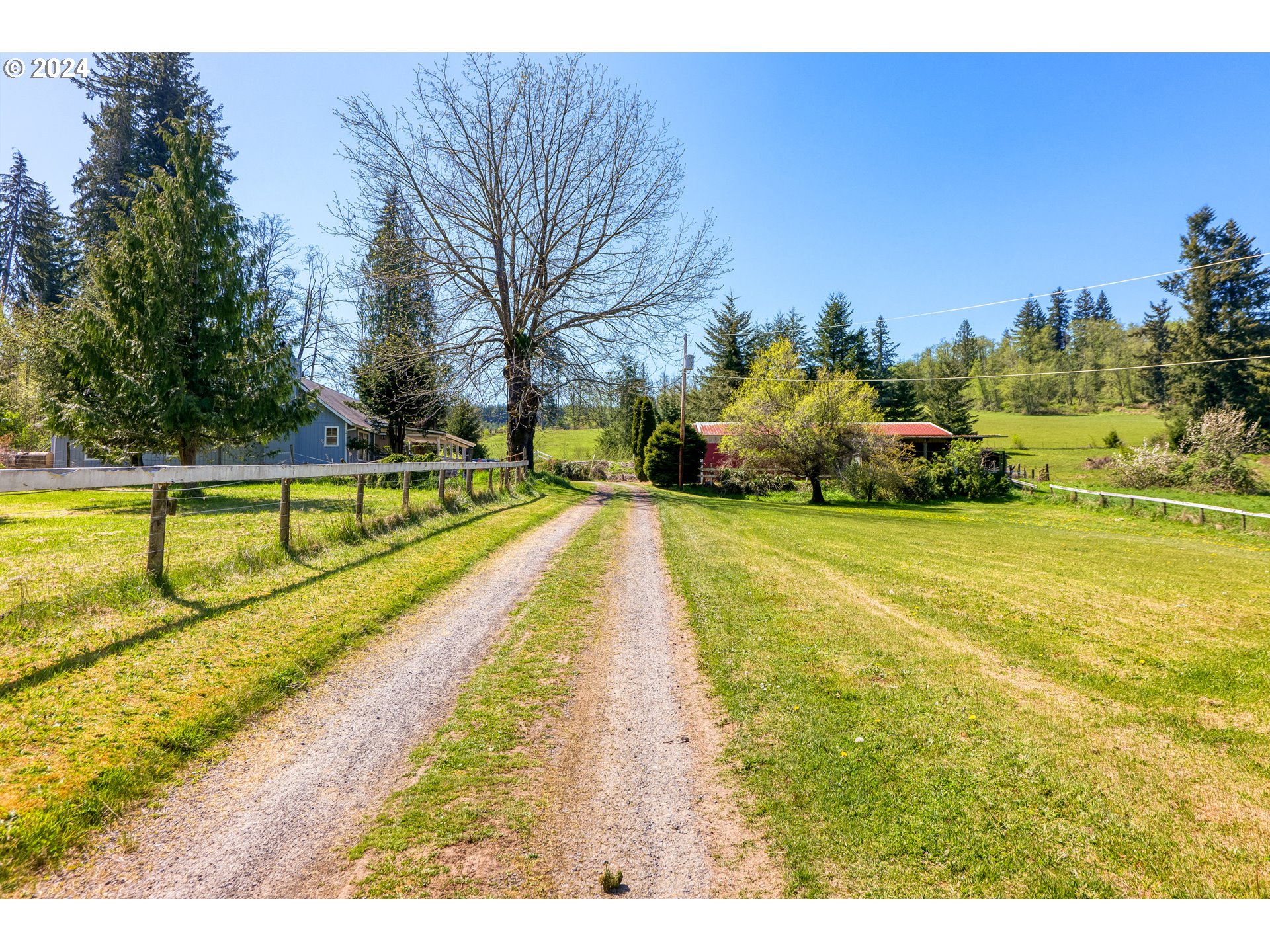 72523 Apiary Road Rainier, OR 97048 - Photo 1 of 23 a view of a swimming pool with an outdoor space and seating area