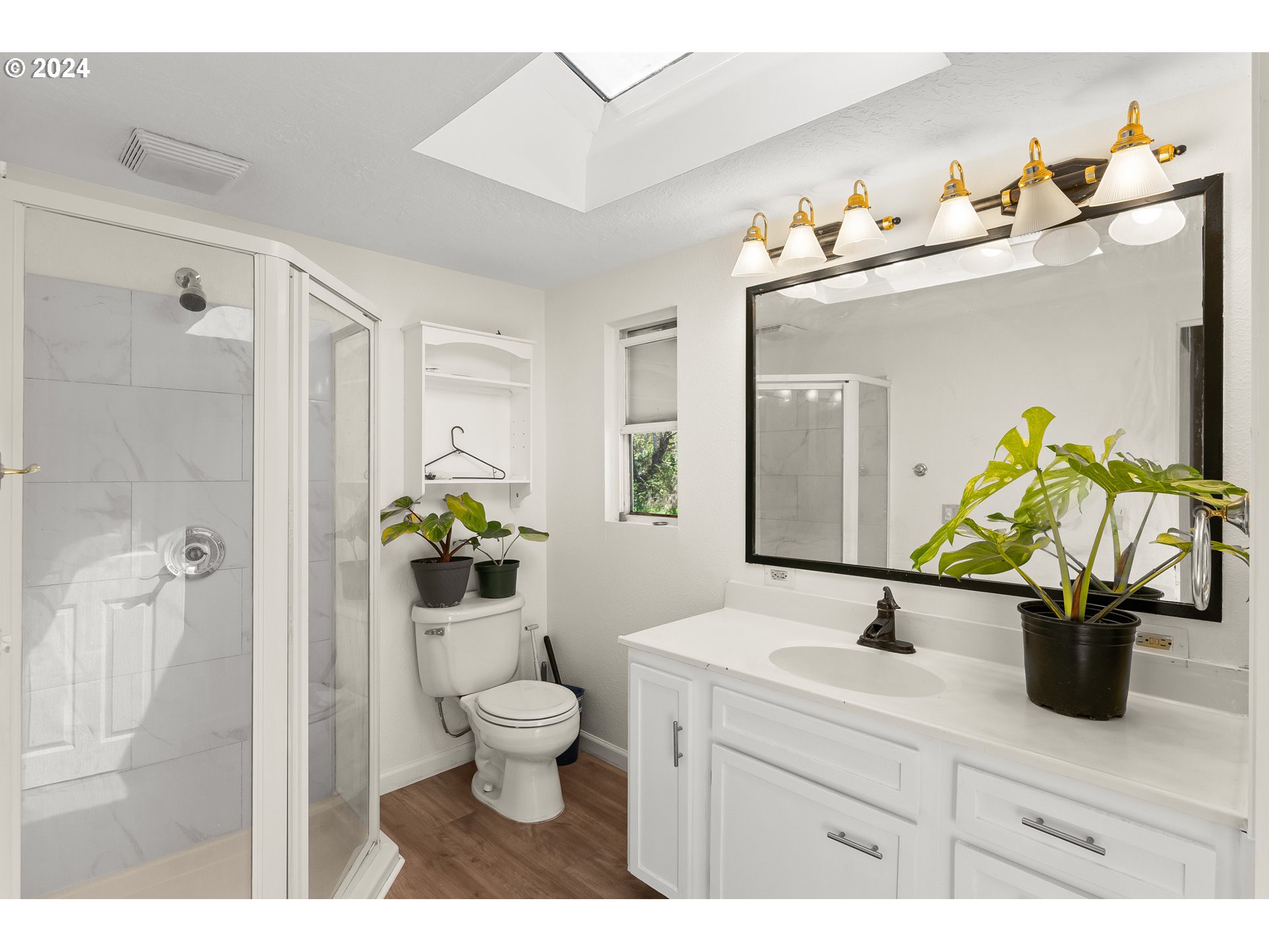72523 Apiary Road Rainier, OR 97048 - Photo 14 of 23 a bathroom with a sink a toilet and a mirror