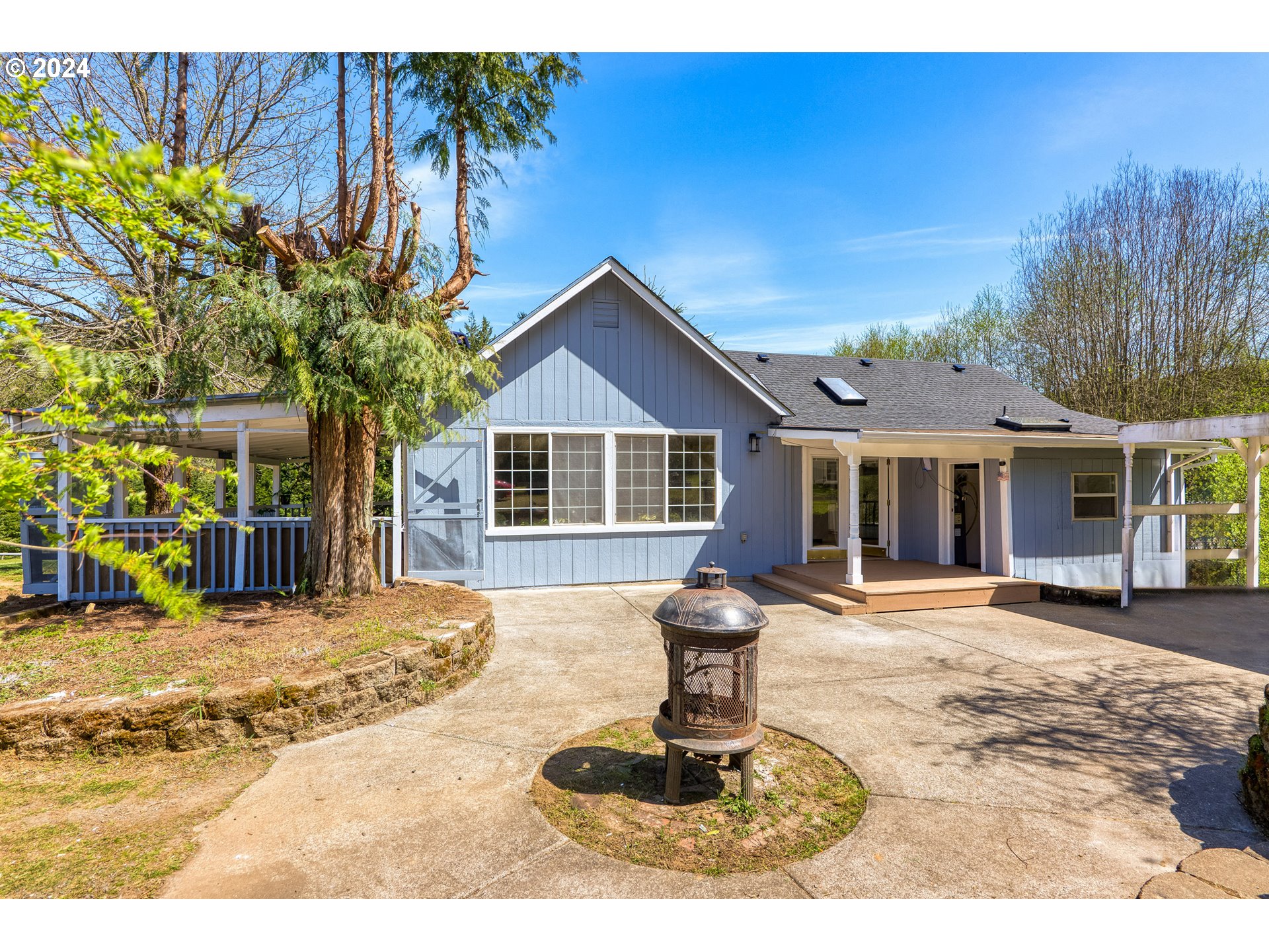 72523 Apiary Road Rainier, OR 97048 - Photo 19 of 23 a view of a house with a patio