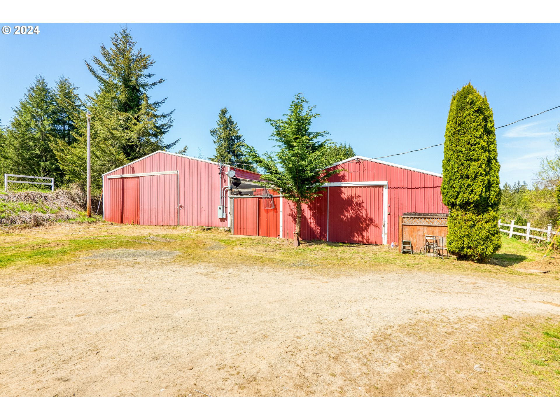 72523 Apiary Road Rainier, OR 97048 - Photo 23 of 23 a house with swimming pool in front of it