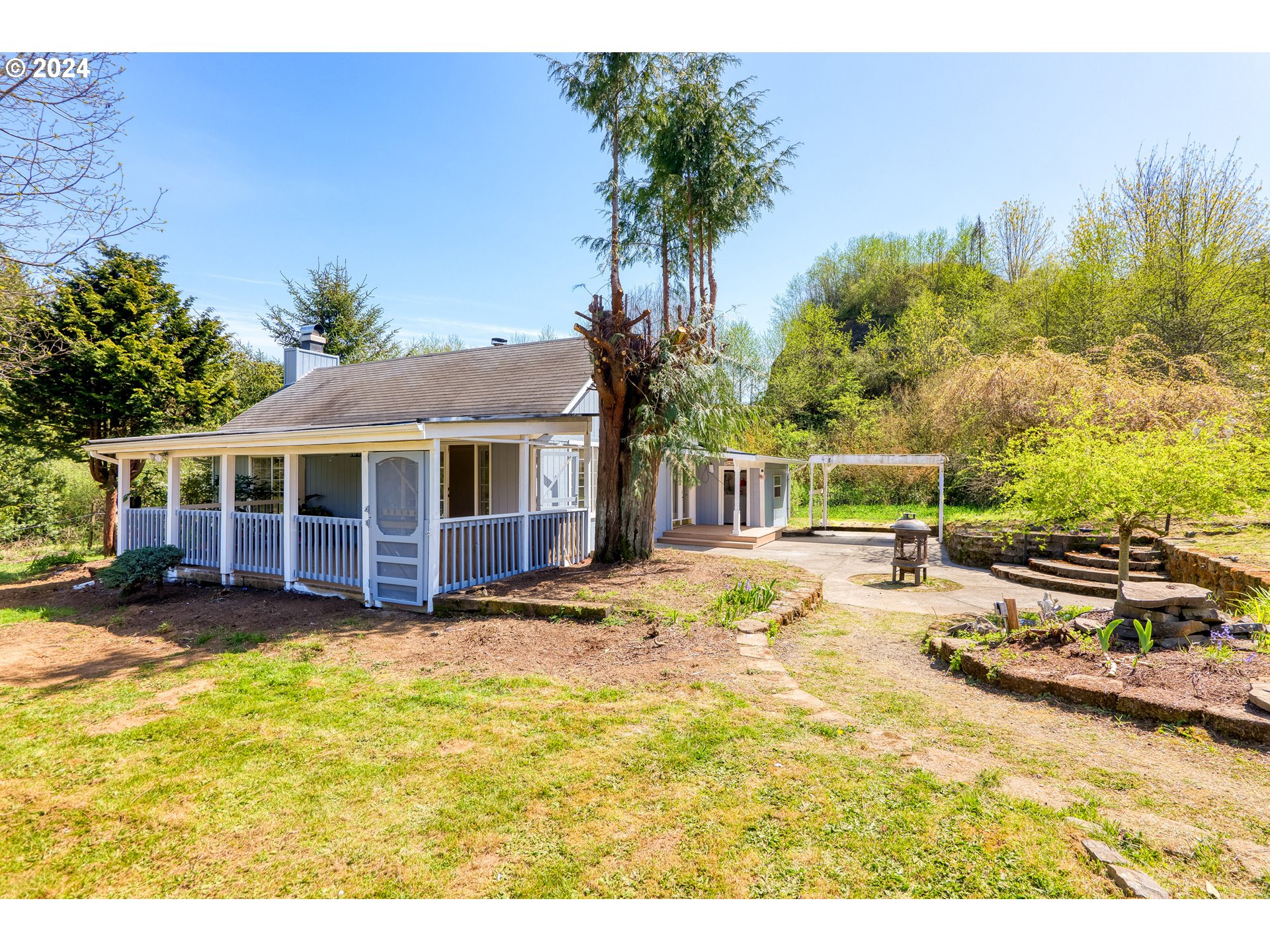 72523 Apiary Road Rainier, OR 97048 - Photo 3 of 23 a view of a house with pool and sitting area