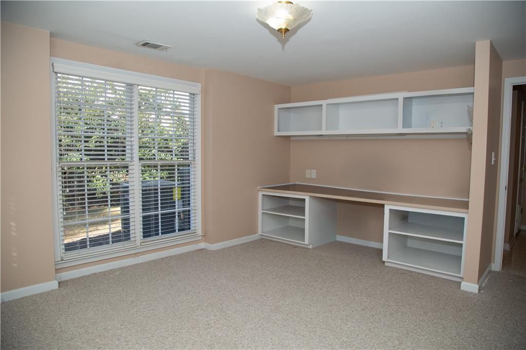 5735 Sunset Maple Drive Alpharetta, GA 30005 - Photo 32 of 39 a view of an empty room with a window
