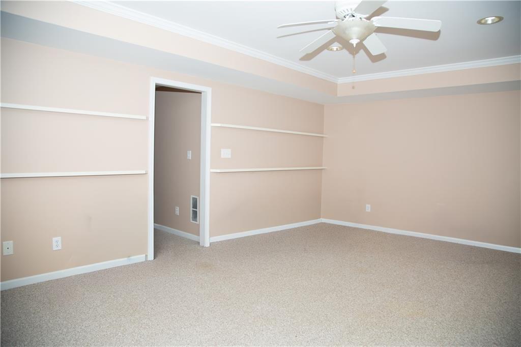 5735 Sunset Maple Drive Alpharetta, GA 30005 - Photo 33 of 39 an empty room with a empty space