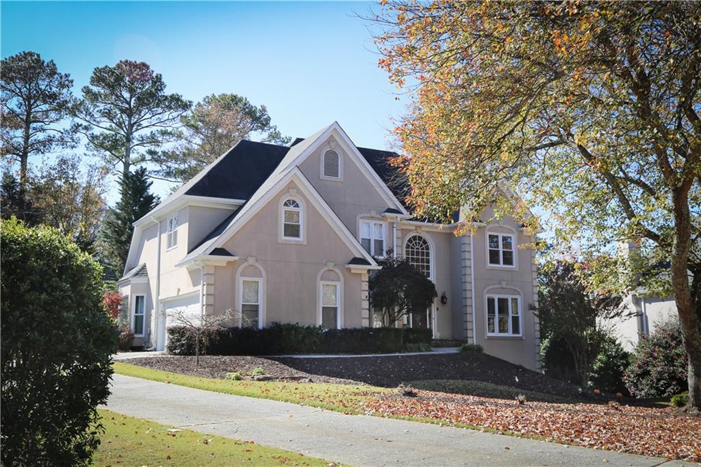5735 Sunset Maple Drive Alpharetta, GA 30005 - Photo 4 of 39 a view of house with yard