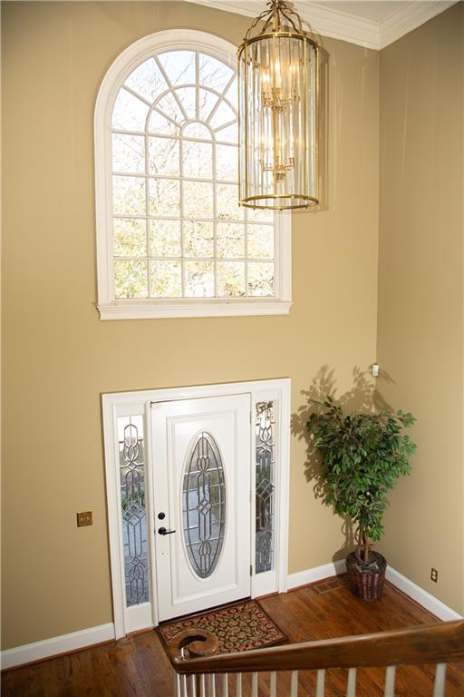 5735 Sunset Maple Drive Alpharetta, GA 30005 - Photo 10 of 39 a view of entryway with wooden floor