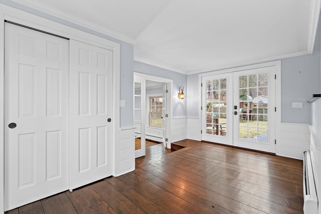 106 Lewis Avenue Walpole, MA 02081 - Photo 18 of 36 wooden floor in an empty room with a window