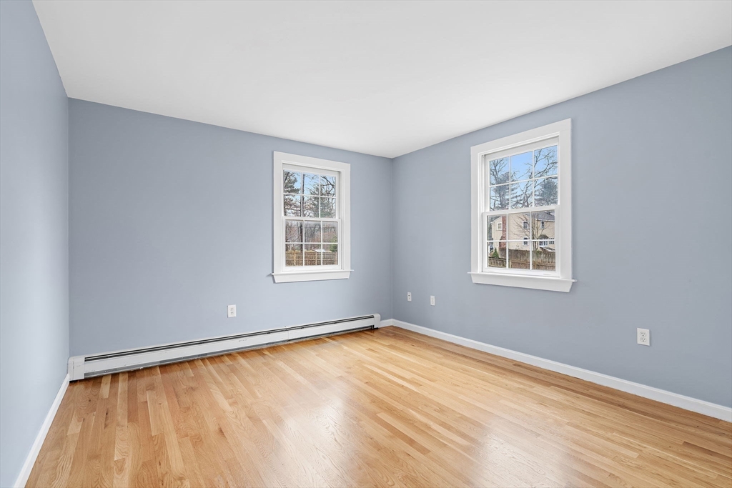 106 Lewis Avenue Walpole, MA 02081 - Photo 25 of 36 a view of an empty room with a window