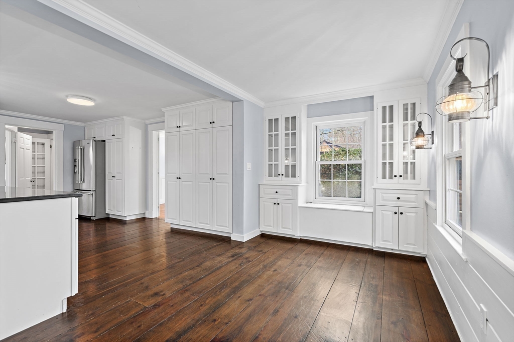 106 Lewis Avenue Walpole, MA 02081 - Photo 3 of 36 a view of empty room with wooden floor and window