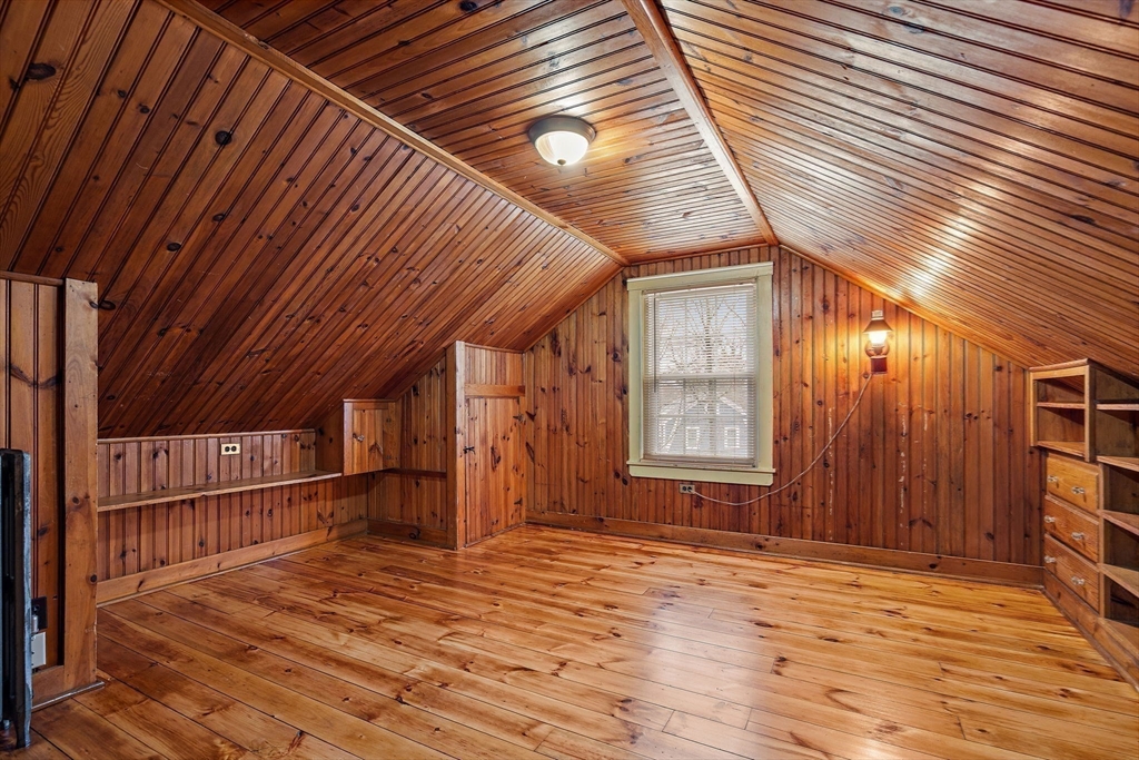 106 Lewis Avenue Walpole, MA 02081 - Photo 31 of 36 a view of empty room with wooden floor and fan