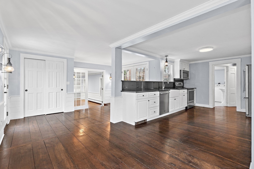 106 Lewis Avenue Walpole, MA 02081 - Photo 8 of 36 a view of kitchen with wooden floor and electronic appliances