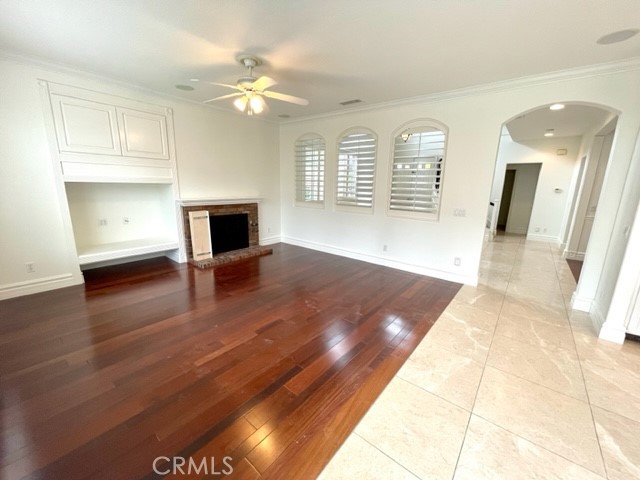 27585 Rosebud Way Laguna Niguel, CA 92677 - Photo 16 of 35 wooden floor in an empty room with a fireplace