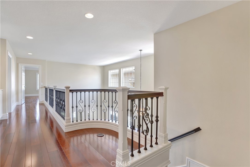 27585 Rosebud Way Laguna Niguel, CA 92677 - Photo 18 of 35 a view of staircase with white walls and a window