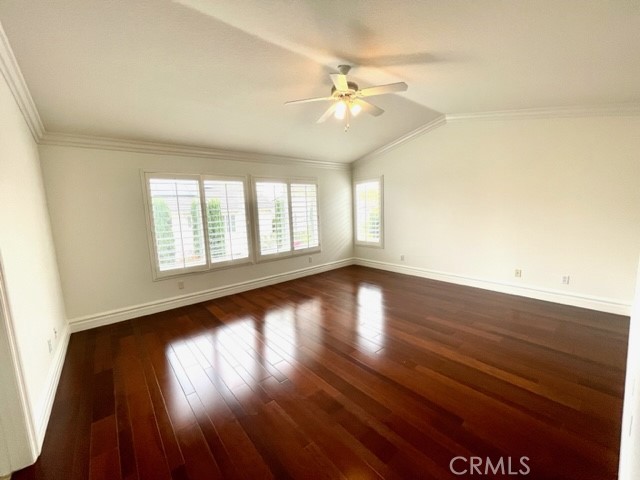 27585 Rosebud Way Laguna Niguel, CA 92677 - Photo 20 of 35 a view of an empty room with wooden floor and a window