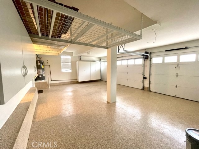 27585 Rosebud Way Laguna Niguel, CA 92677 - Photo 25 of 35 a view of a hallway with wooden floor