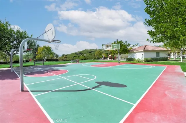a view of a patio with a backyard table and chairs