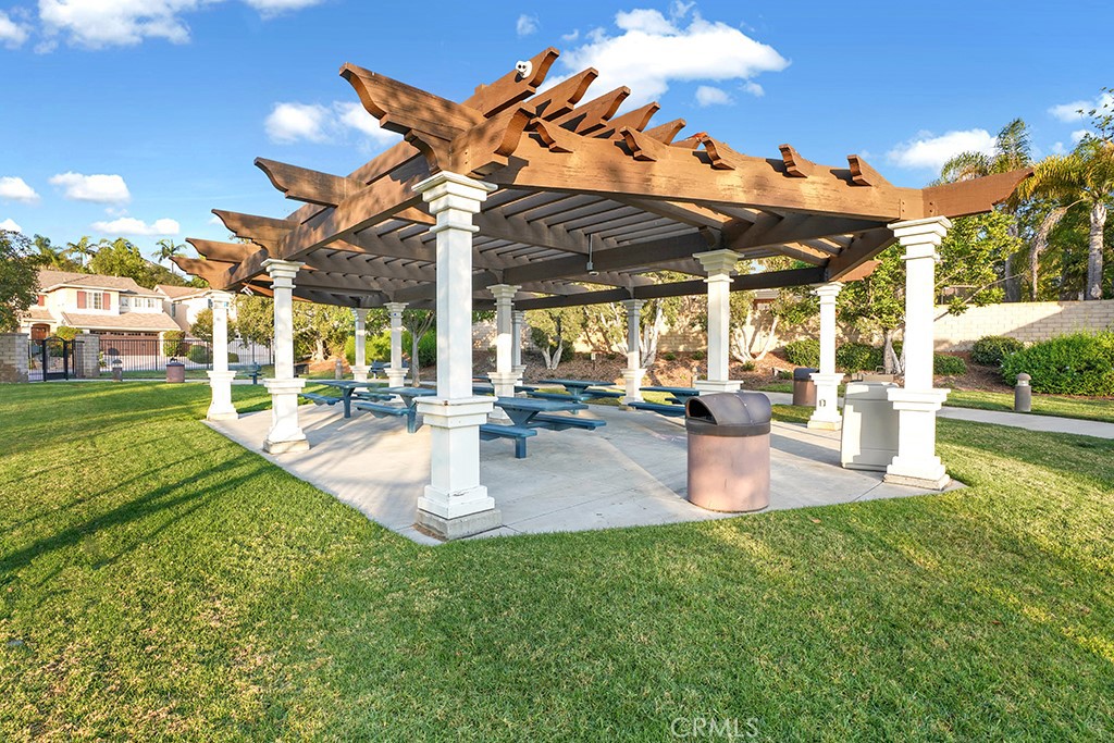 27585 Rosebud Way Laguna Niguel, CA 92677 - Photo 32 of 35 a view of a patio with a backyard table and chairs